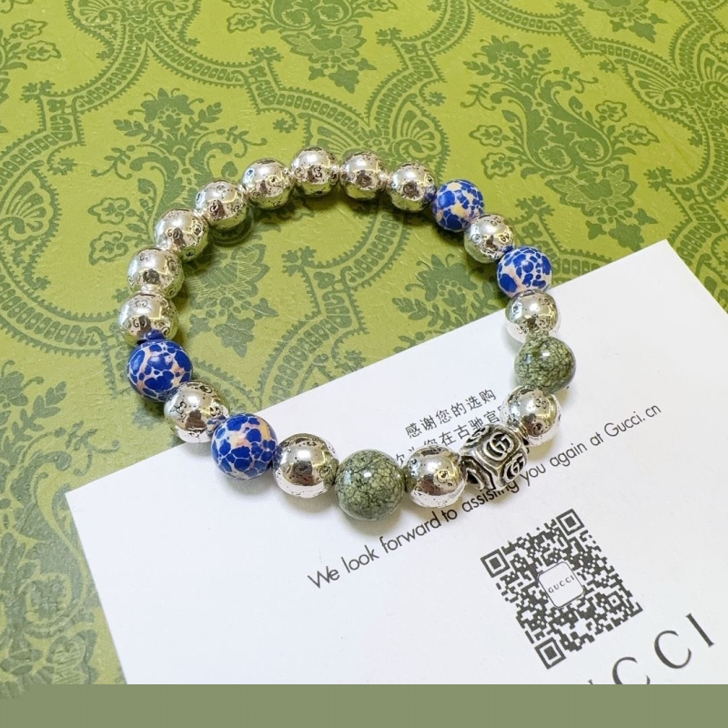 G*u*i bracelets